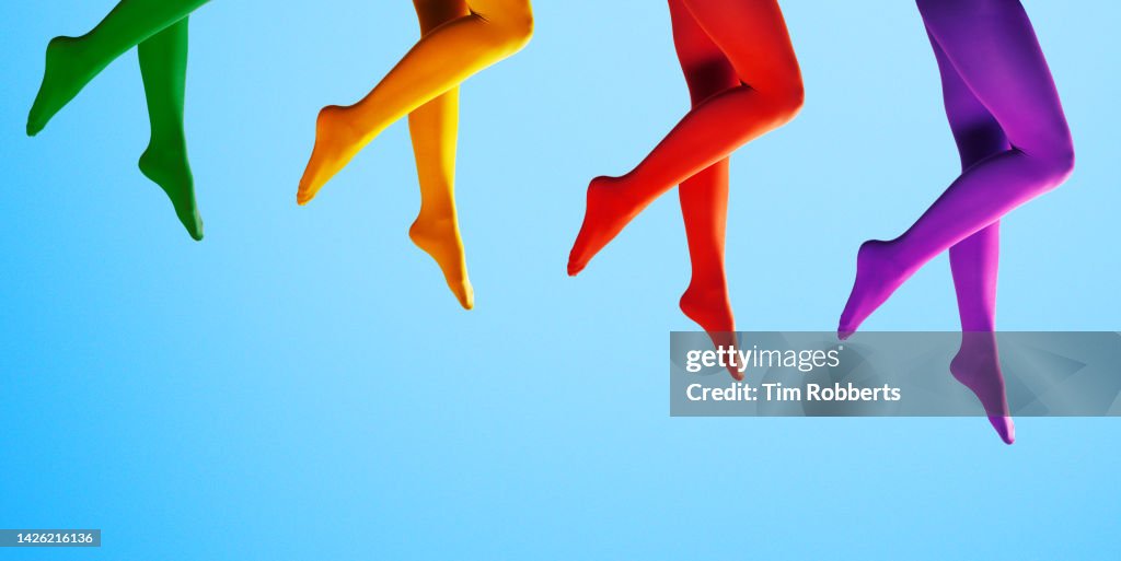 Legs with different colour tights