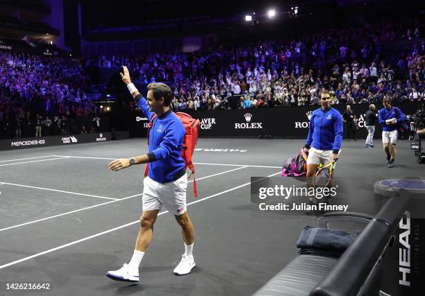 Roger Federer of Team Europe acknowledges the crowd as he walks onto centre court during a practice session ahead of the Laver Cup at The O2 Arena on...