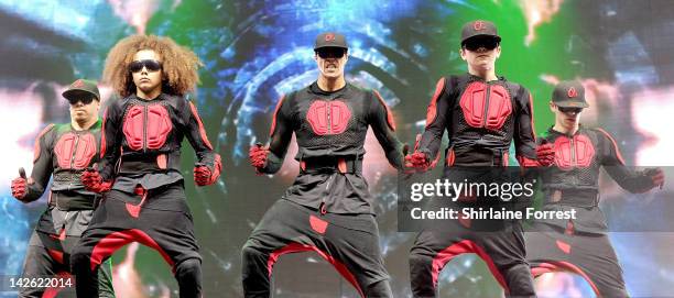 Ashley Banjo and Perri Luc Kiely of dance troupe Diversity perform at MEN Arena on April 9, 2012 in Manchester, England.