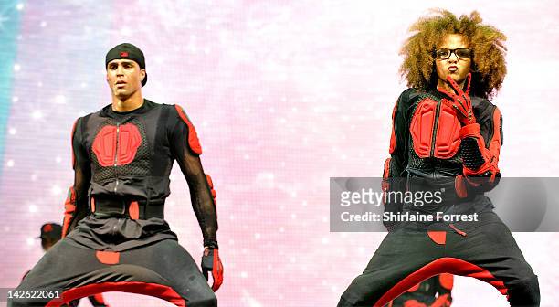 Ashley Banjo and Perri Luc Kiely of dance troupe Diversity perform at MEN Arena on April 9, 2012 in Manchester, England.