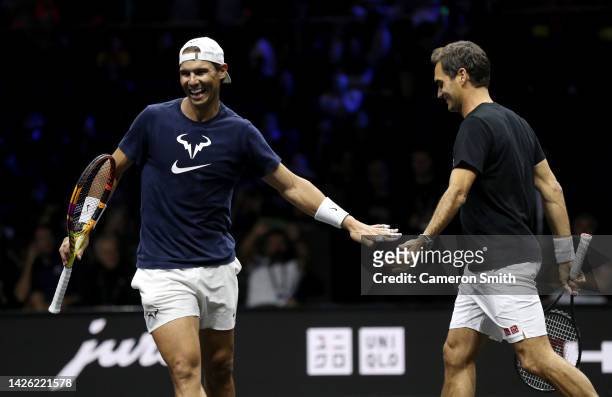 Rafael Nadal and Roger Federer of Team Europe interact during a practice session on centre court ahead of the Laver Cup at The O2 Arena on September...