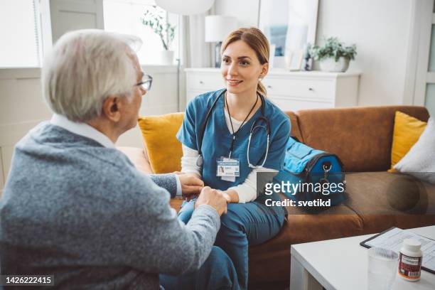 home care for old people - home visit stock pictures, royalty-free photos & images