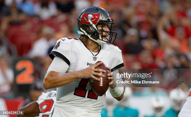 Blaine Gabbert of the Tampa Bay Buccaneers passes during a preseason game against the Miami Dolphins at Raymond James Stadium on August 13, 2022 in...