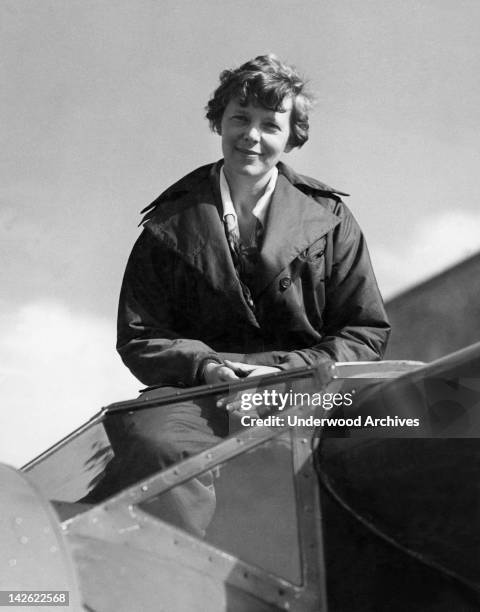 Amelia Earhart in the cockpit of her Lockheed Electra airplane, 1930s.