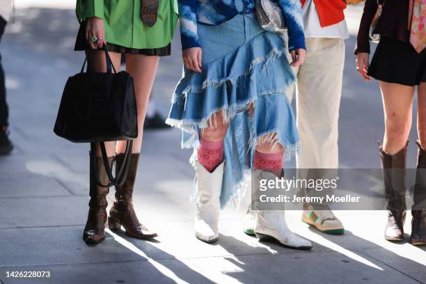 Some guests are seen outside the Masha Popova show, during London Fashion Week on September 17, 2022 in London, England.