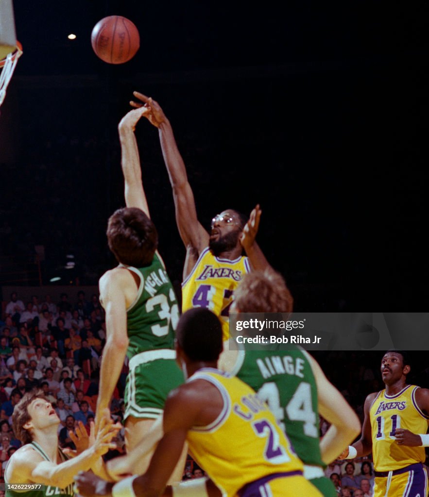 James Worthy shoots over Kevin McHale during Lakers vs. Celtics NBA Finals
