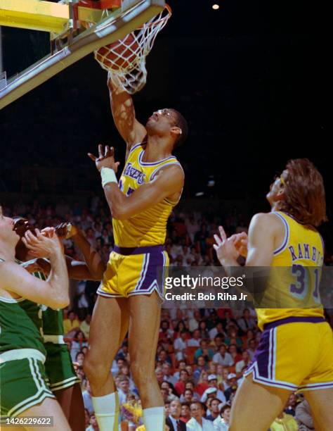 Lakers Kareem Abdul-Jabbar shoots over Celtics Larry Bird during 1985 NBA Finals between Los Angeles Lakers and Boston Celtics, June 2, 1985 in...