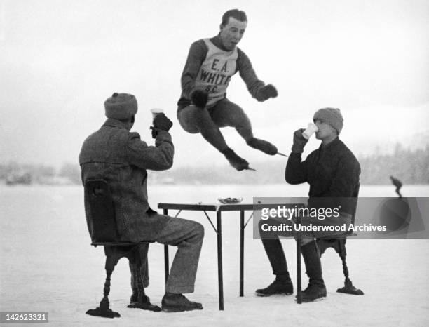 Joe Moore, world champion amateur indoor skater, trains for international competition, Lake Placid, New York, late 1910s or early 1920s. Moore...