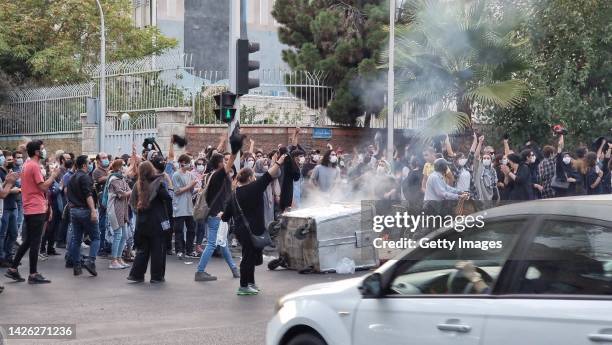 People gather in protest against the death of Mahsa Amini along the streets on September 19, 2022 in Tehran, Iran. 22-year-old Mahsa Amini fell into...