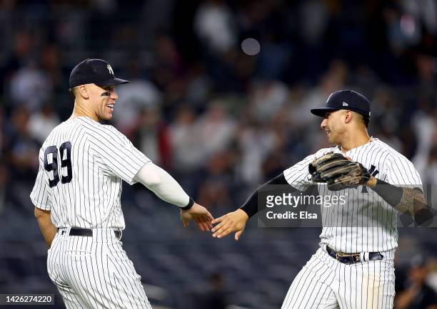 Aaron Judge of the New York Yankees celebrates the win with teammate Gleyber Torres after the game against the Pittsburgh Pirates at Yankee Stadium...