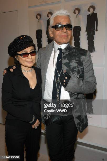 Yoko Ono and designer Karl Lagerfeld attend Chanel\'s THEN NOW exhibit at Visionaire Gallery.