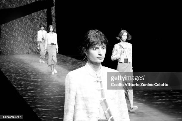 Models walk the runway of the Emporio Armani Fashion Show during the Milan Fashion Week Womenswear Spring/Summer 2023 on September 22, 2022 in Milan,...