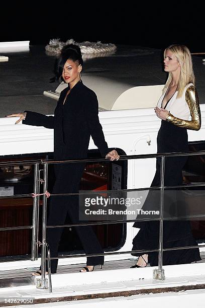 Rihanna and Brooklyn Decker arrive at the "Battleship" Australian premiere at Luna Park on April 10, 2012 in Sydney, Australia.