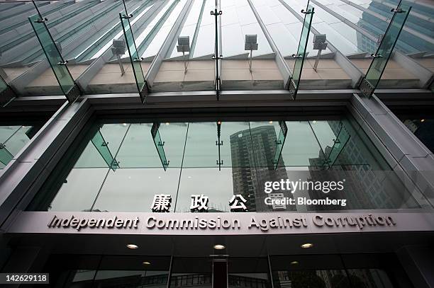 Signage for the Hong Kong Independent Commission Against Corruption is displayed outside the commission's headquarters in Hong Kong, China, on...