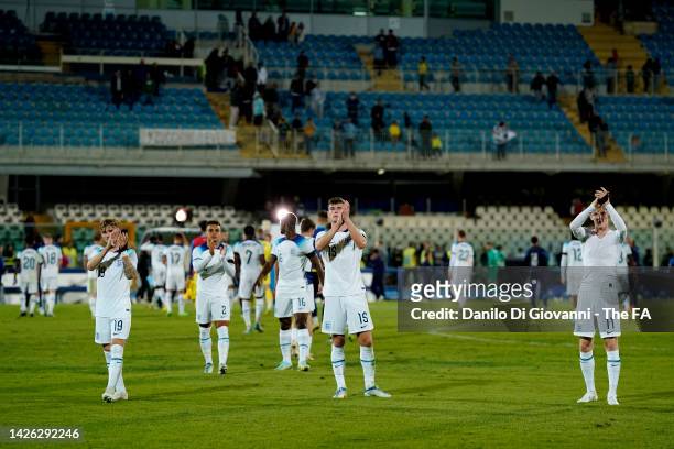 Harvey Elliot, Charlie Cresswell and Anthony Gordon of England applaud fans after the International Friendly match between Italy U21 and England U21...