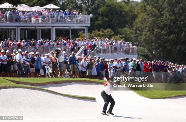 Hideki Matsuyama of Japan and the International Team plays a second shot on the first hole during the Thursday foursome matches on day one of the...