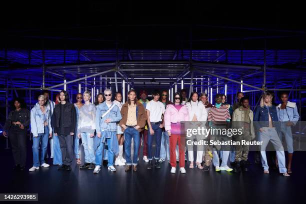 Models pose during the runway at the Levi's show during the ABOUT YOU Fashion Week Milan 2022 at Zona Farini on September 22, 2022 in Milan, Italy.