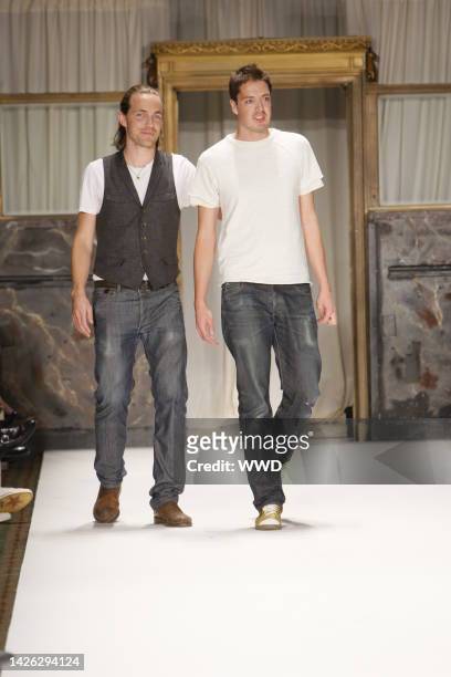 Fashion designers David Neville and Marcus Wainwright on the runway after Rag & Bone's spring 2008 show on New York City.