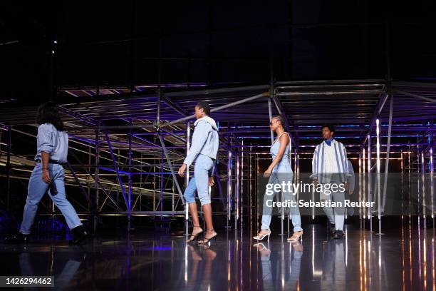 Models walk the runway at the Levi's show during the ABOUT YOU Fashion Week Milan 2022 at Zona Farini on September 22, 2022 in Milan, Italy.