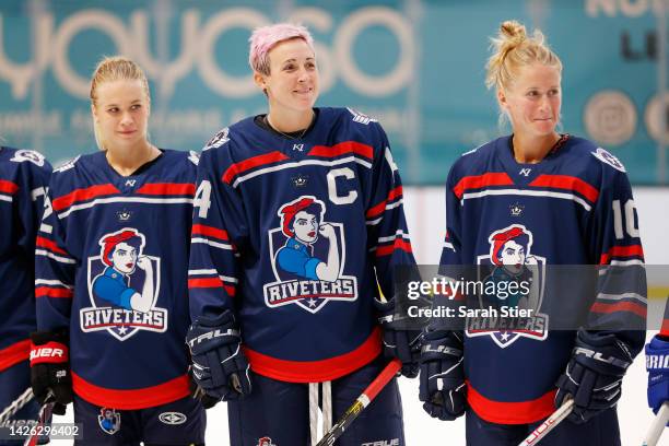 Team captain Madison Packer looks on with teammates during a press conference and practice session at The Rink at American Dream on September 22,...