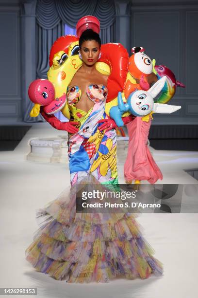 Imaan Hammam walks the runway of the Moschino Fashion Show during the Milan Fashion Week Womenswear Spring/Summer 2023 on September 22, 2022 in...