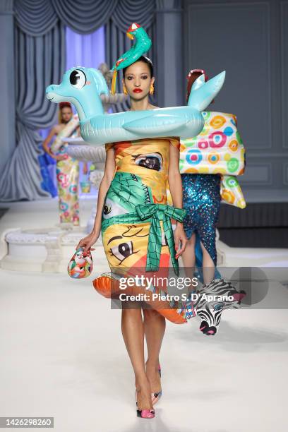 Model walks the runway of the Moschino Fashion Show during the Milan Fashion Week Womenswear Spring/Summer 2023 on September 22, 2022 in Milan, Italy.