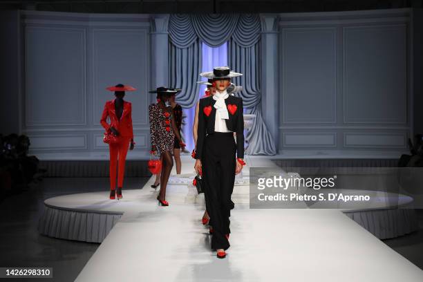 Models walk the runway of the Moschino Fashion Show during the Milan Fashion Week Womenswear Spring/Summer 2023 on September 22, 2022 in Milan, Italy.