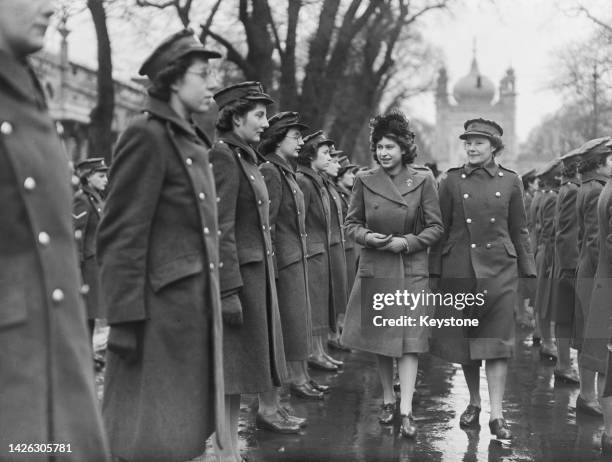 Princess Elizabeth inspecting members of the ATS at the entrance to the Brighton Dome during a visit to Brighton, East Sussex, 4th December 1945.