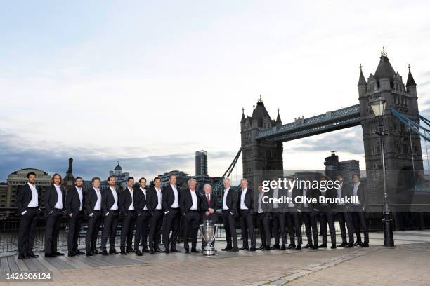 In this photograph released today, the players from Team Europe and Team World along with Rod Laver pose for a photograph with the trophy in-front of...