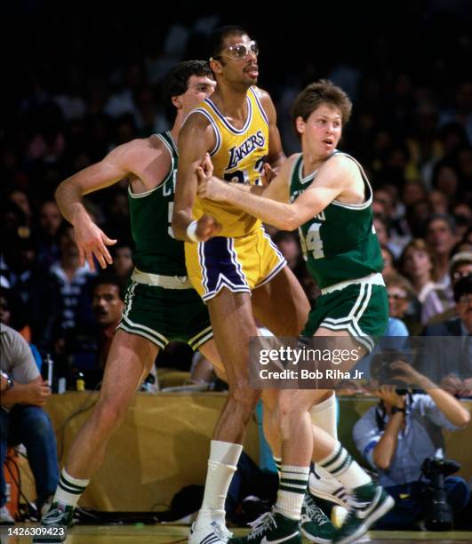 Celtics Danny Ainge and Greg Kite surround Lakers Kareem Abdul-Jabbar during 1985 NBA Finals between Los Angeles Lakers and Boston Celtics, June 4,...