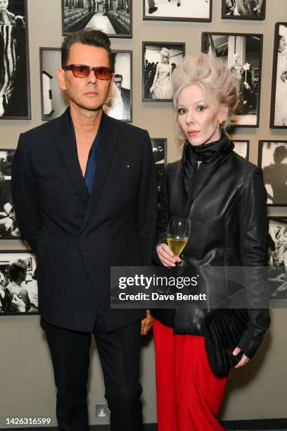 Carlo Brandelli and Ewa Wilczynski attend the launch of Gavin Bond's 'BEING THERE', presented by Moët & Chandon, at Hamiltons Gallery on September...