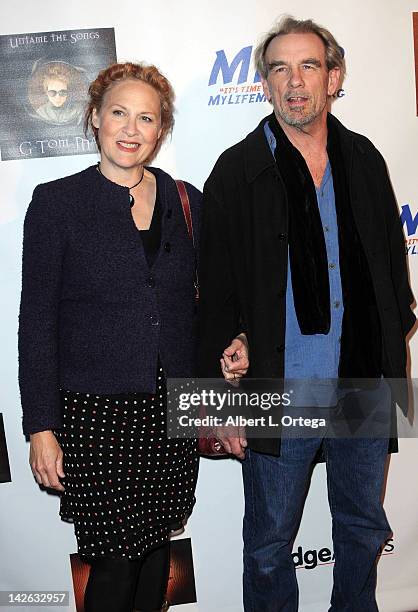 Actor John Diehl and wife Julie Christensen arrive for the G Tom Mac CD Release Party For "Untame The Songs" held at Rolling Stone Restaurant &...