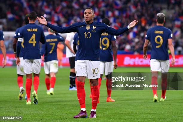 Kylian Mbappe of France celebrates after scoring their side's first goal during the UEFA Nations League League A Group 1 match between France and...