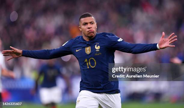 Kylian Mbappe of France celebrates after scoring their side's first goal during the UEFA Nations League League A Group 1 match between France and...