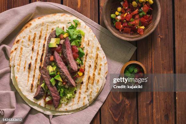 tacos with beef meat and salad - salsa sauce stock pictures, royalty-free photos & images