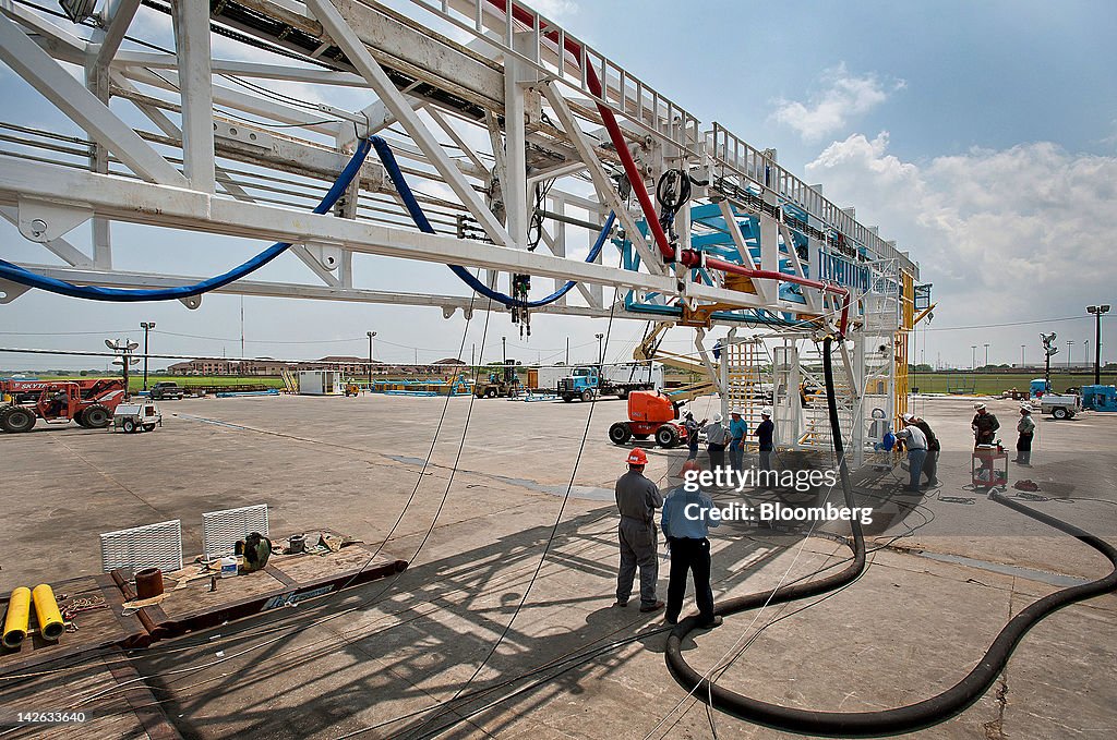 To Orion Rig Workers prepare the Orion Drilling Co.'s Polaris oil and gas drilling ...