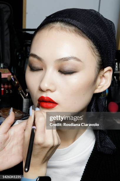 Model He Cong is see during the make up backstage at the Moschino Fashion Show during the Milan Fashion Week Womenswear Spring/Summer 2023 on...