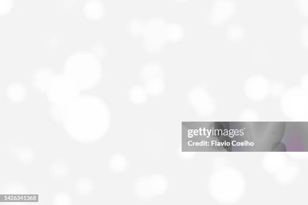 out of focus white lights - lens flare white background stock pictures, royalty-free photos & images