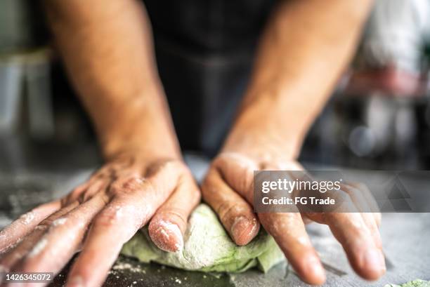 preparing dough for pasta at commercial kitchen - course meal stock pictures, royalty-free photos & images