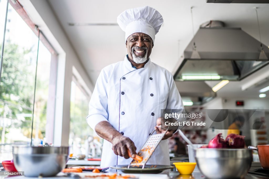 Cooking Potrait Portrait Of A Male Chef Cooking In The Kitchen High-Res Stock Photo ...