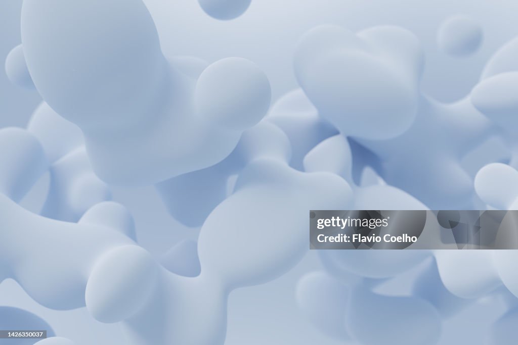 Light blue liquid floating in the air