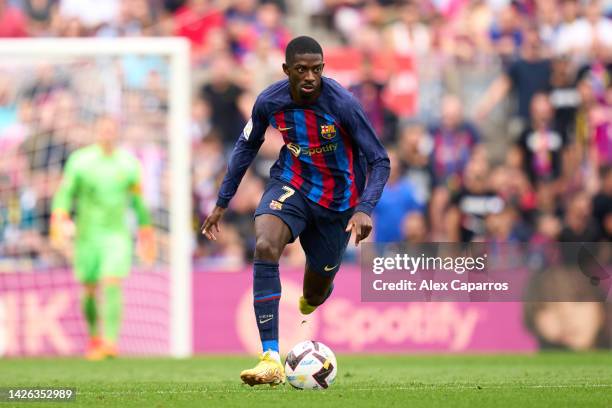 Ousmane Dembele of FC Barcelona runs with the ball during the LaLiga Santander match between FC Barcelona and Elche CF at Spotify Camp Nou on...