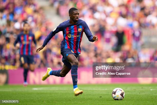 Ousmane Dembele of FC Barcelona runs with the ball during the LaLiga Santander match between FC Barcelona and Elche CF at Spotify Camp Nou on...