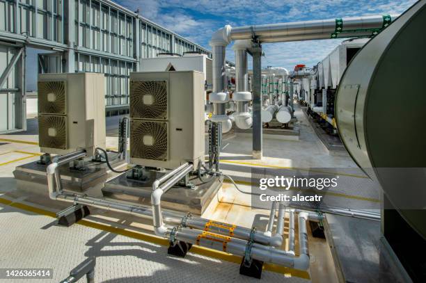 hvac for large office building - condenser stock pictures, royalty-free photos & images