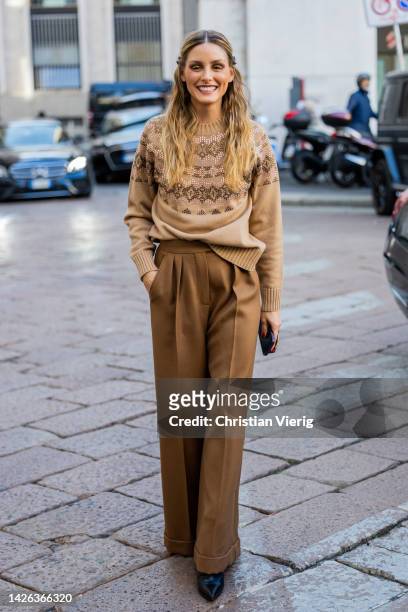 Olivia Palermo wears brown pants, beige turtleneck outside Max Mara during the Milan Fashion Week - Womenswear Spring/Summer 2023 on September 22,...
