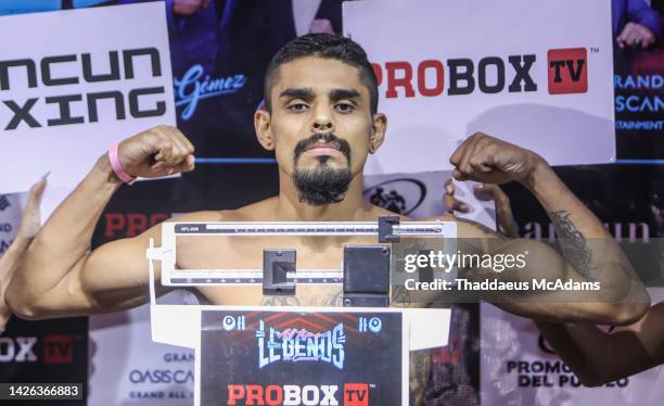 Jfc Boxing Jorge Batalla Martinez flexes on the scale during the weigh in ahead ...