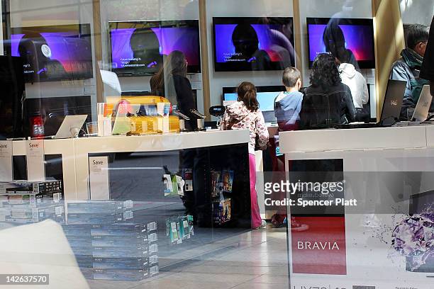 People browse at Sony products at the Sony store on April 10, 2012 in New York City. Sony, the Japanese electronics company, has more than doubled...