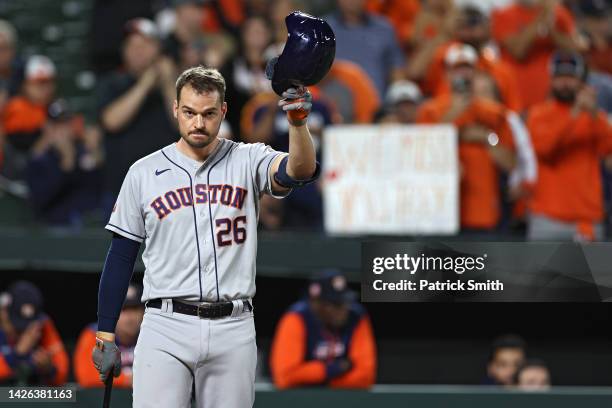 Trey Mancini of the Houston Astros acknowledges the crowd during his first at bat against the Baltimore Orioles during the second inning at Oriole...