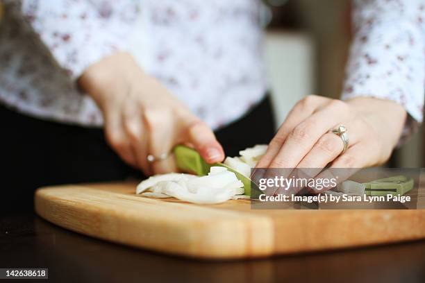 cooking and chopping onions - lady finger vegetable stock pictures, royalty-free photos & images