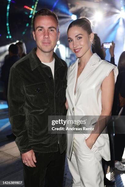 Mario Götze and Ann-Kathrin Götze are seen at the Boss Fashion Show during the Milan Fashion Week Womenswear Spring/Summer 2023 on September 22, 2022...